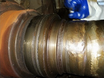 烘缸軸磨損原因分析及在線修復